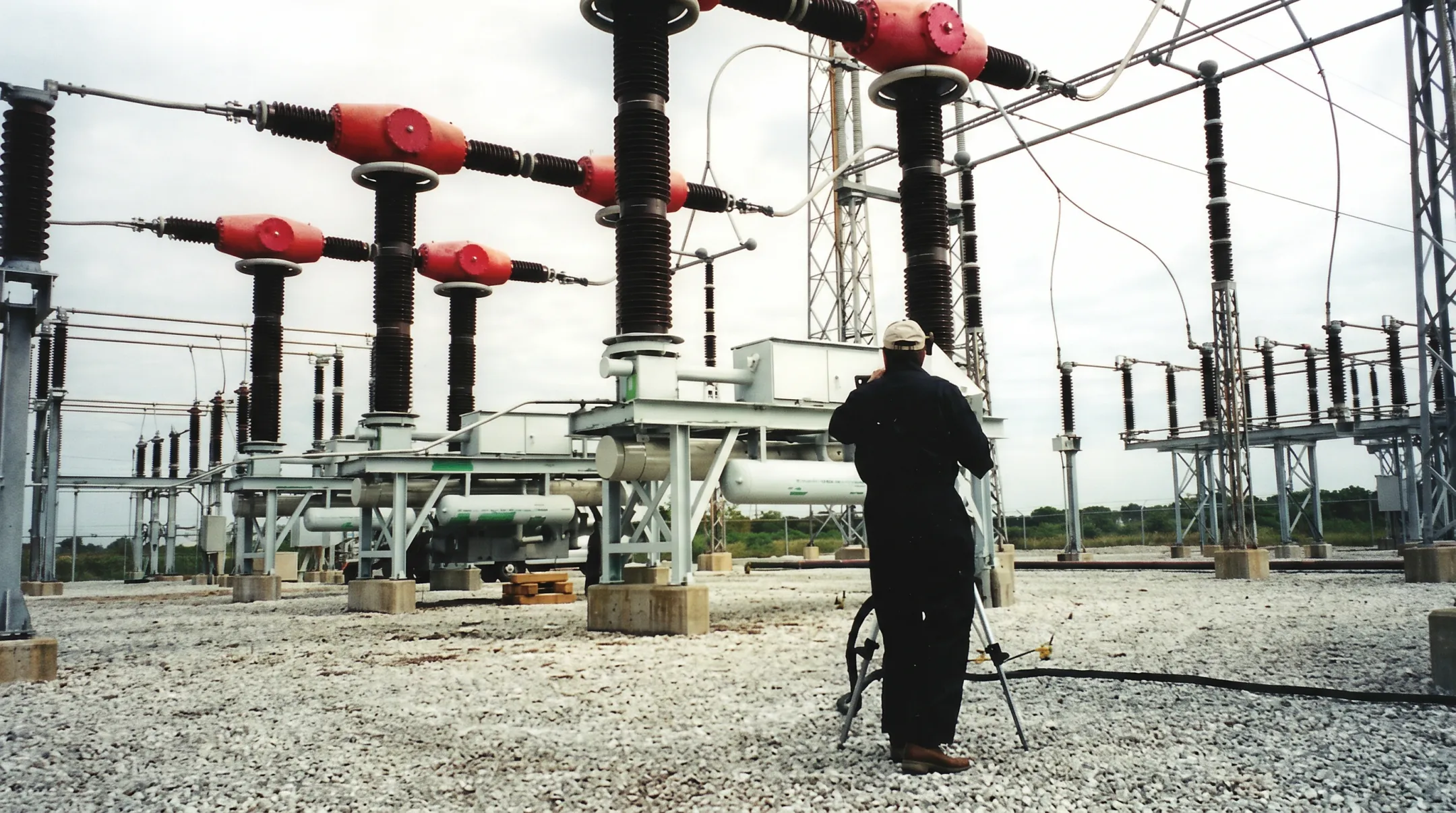Technicians documenting SF6 breaker leak repair and gas recovery records