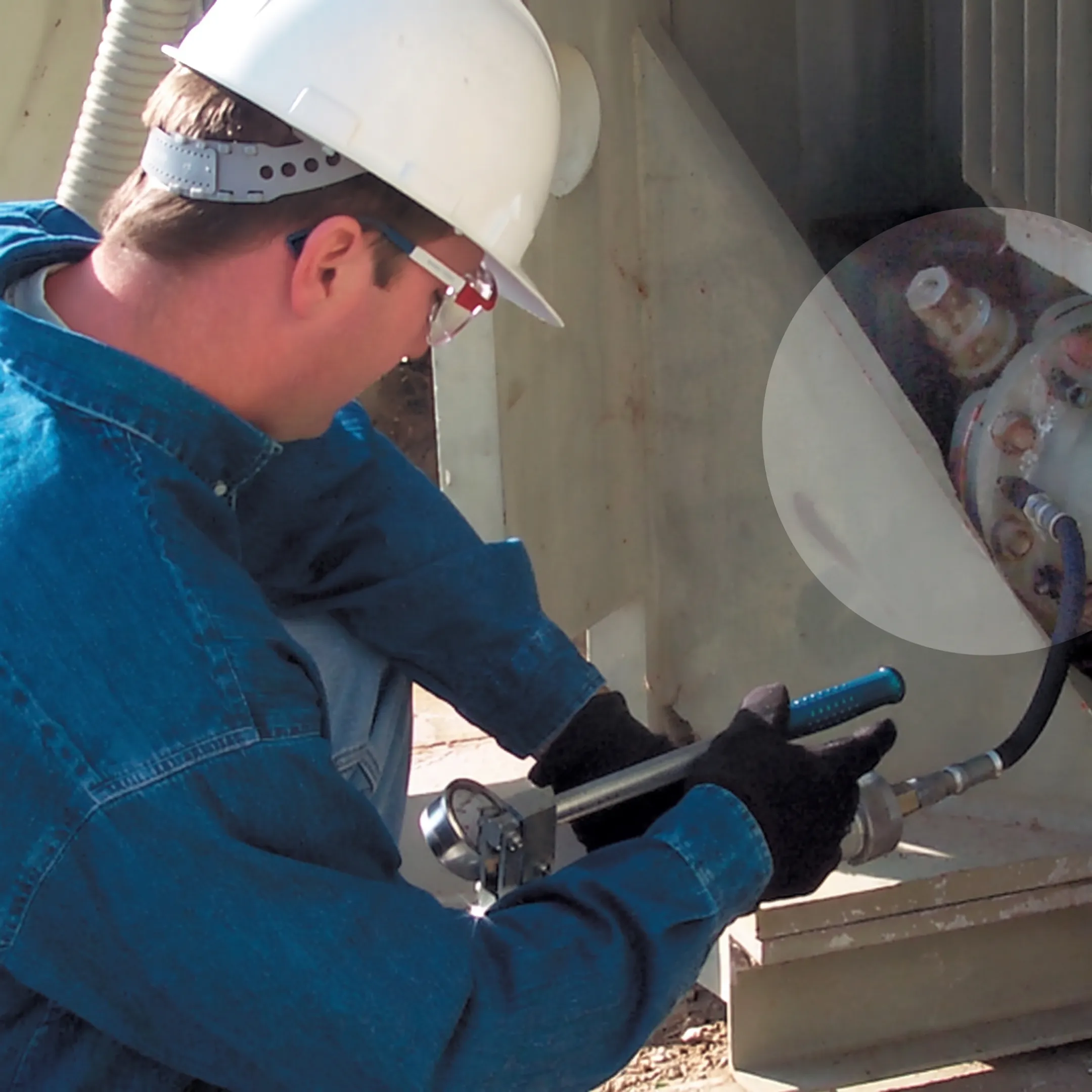 Technician sealing a transformer oil leak without dismantling substation equipment
