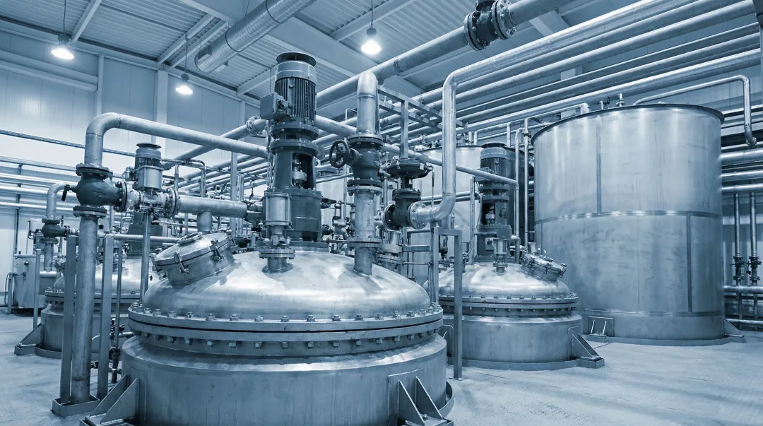 Industrial chemical processing facility with PTFE-lined pipes valves and reactor vessels