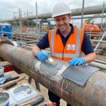 Step-by-step Tech-Bond polymer repair process applied to industrial pipe in a field setting