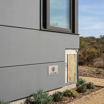 Non-combustible rainscreen cladding on a resilient home exterior