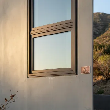 UL-listed fire-rated window assembly in a resilient home