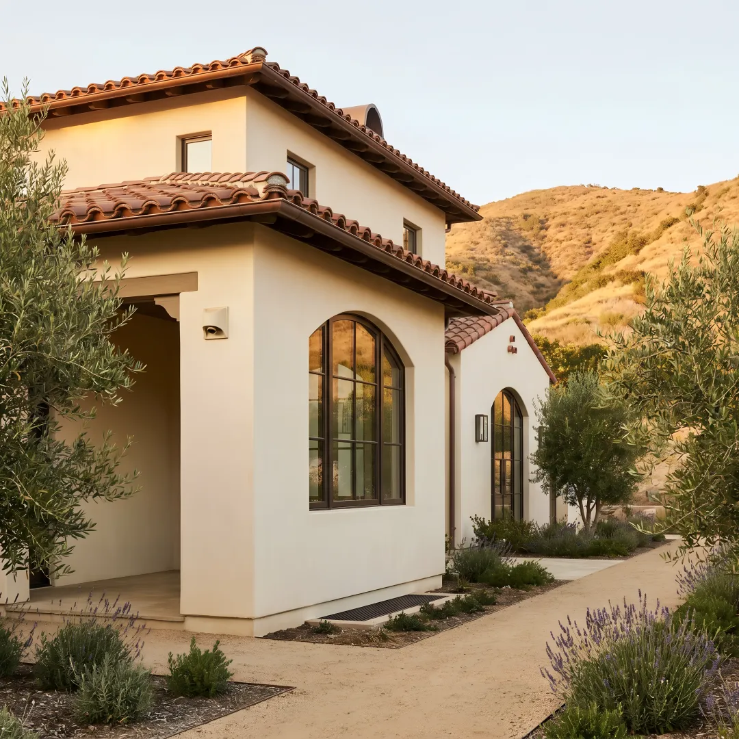 Fire-resilient modern home with integrated defense systems