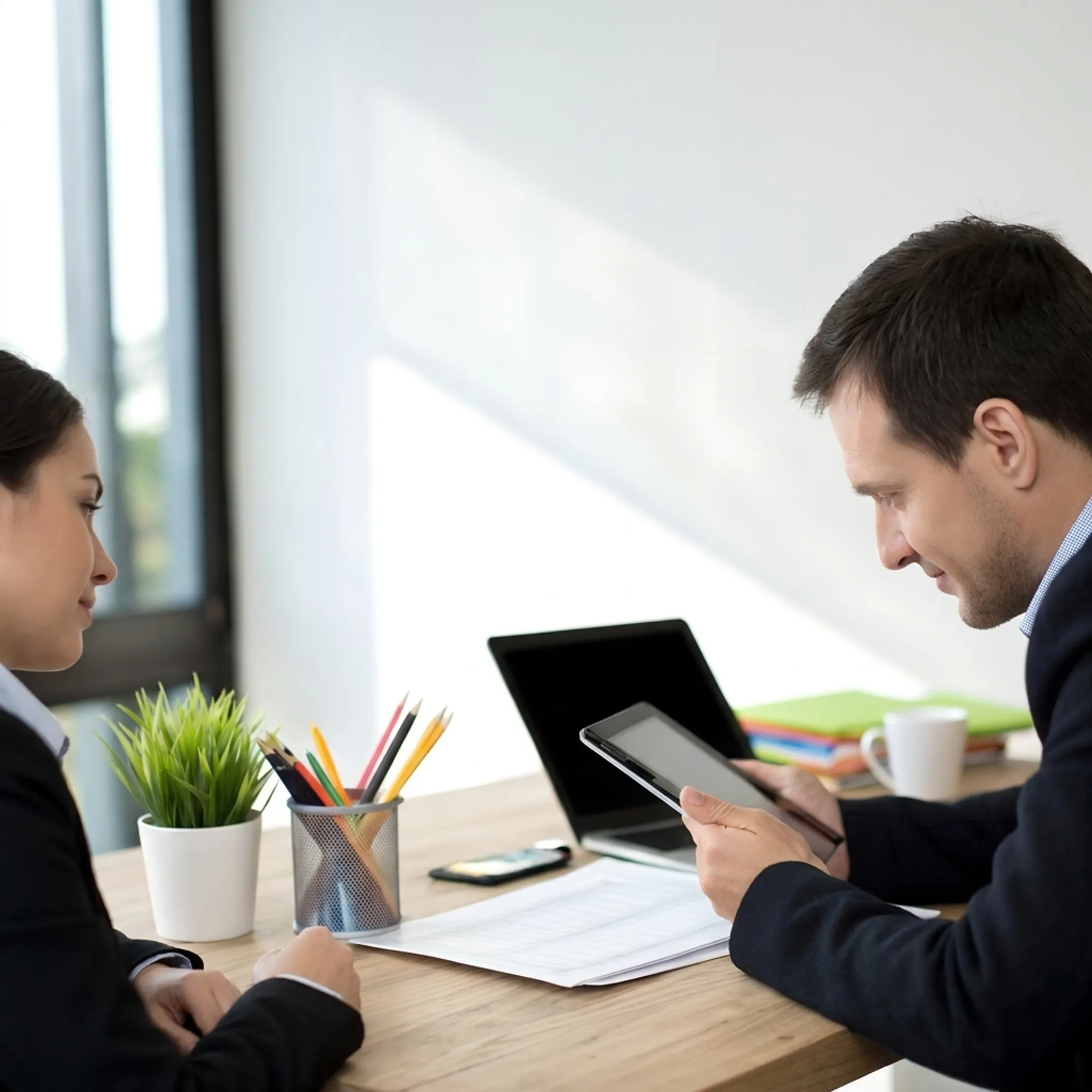 Consultant discussing business connectivity options with a client