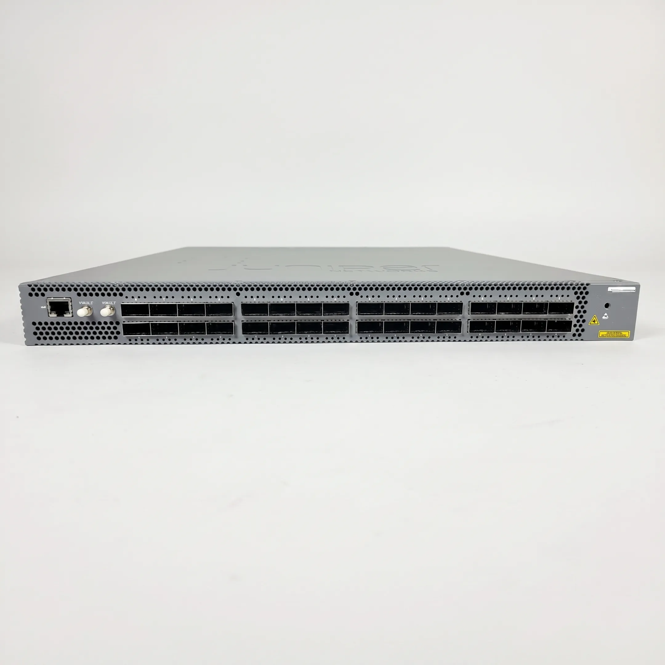 Technician assessing used Cisco network hardware