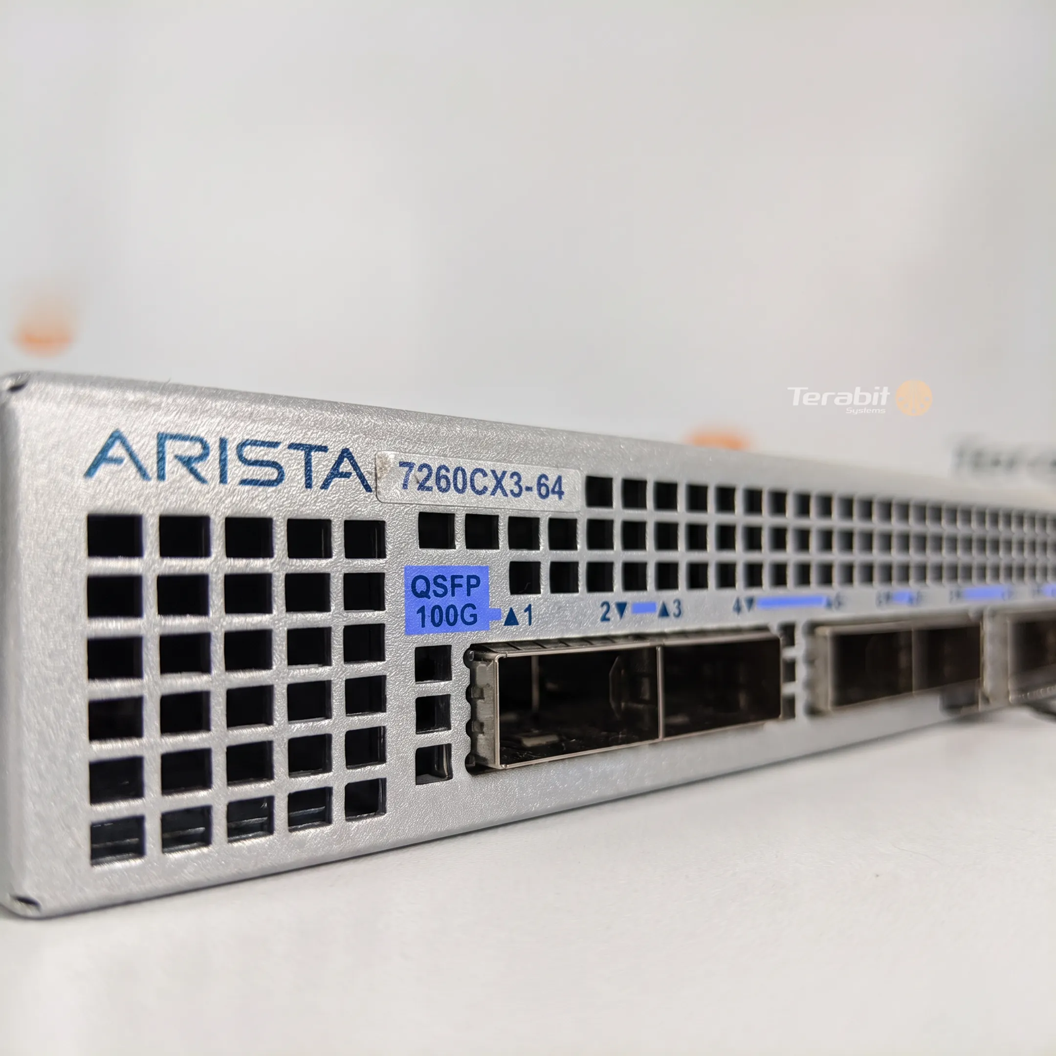 Technician inspecting refurbished enterprise networking hardware