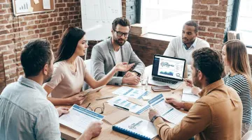 BPO consultant reviewing nearshore partner vetting criteria with client team