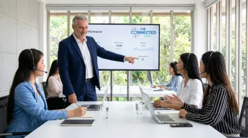 Business process optimization consultant conducting contact center workflow assessment with client team