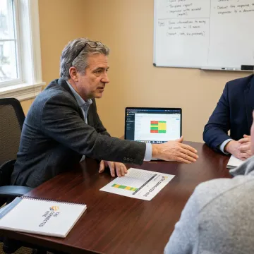 BPO consultant reviewing manufacturing support workflows