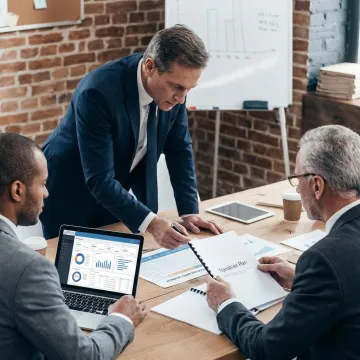 Consultants reviewing contact center transition plans