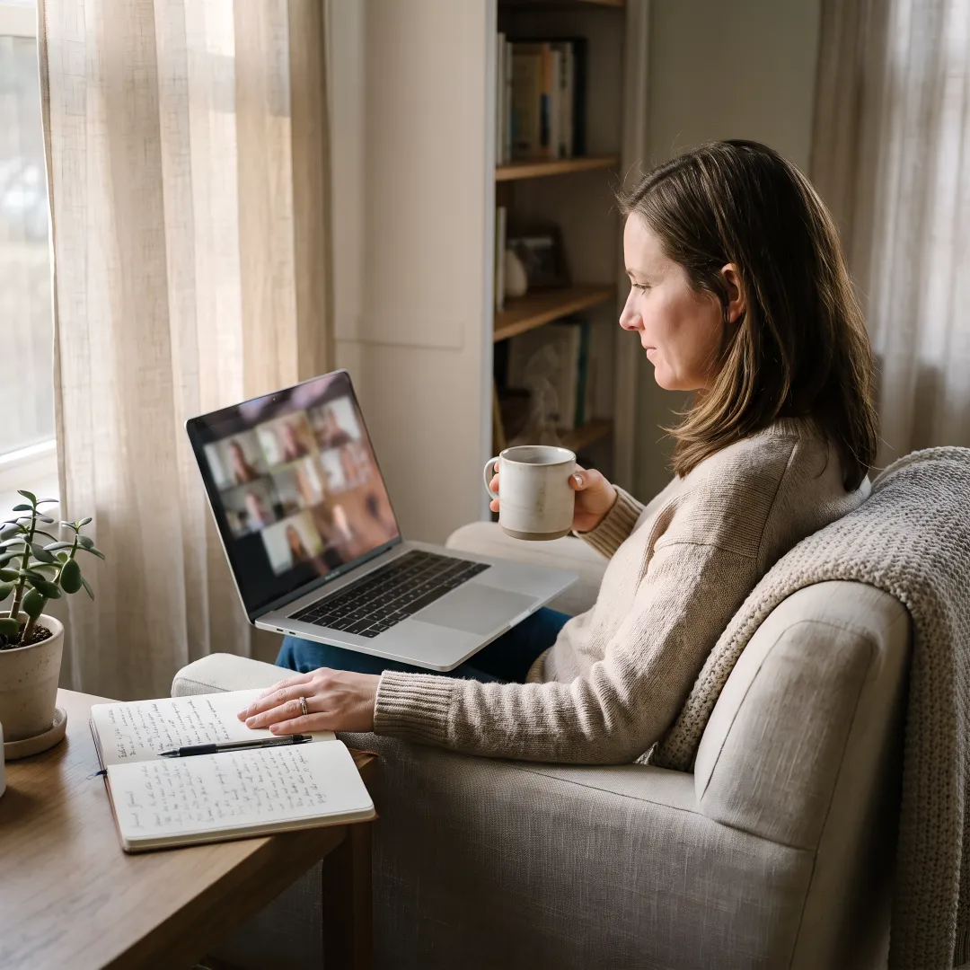Woman receiving online anxiety consultation at home