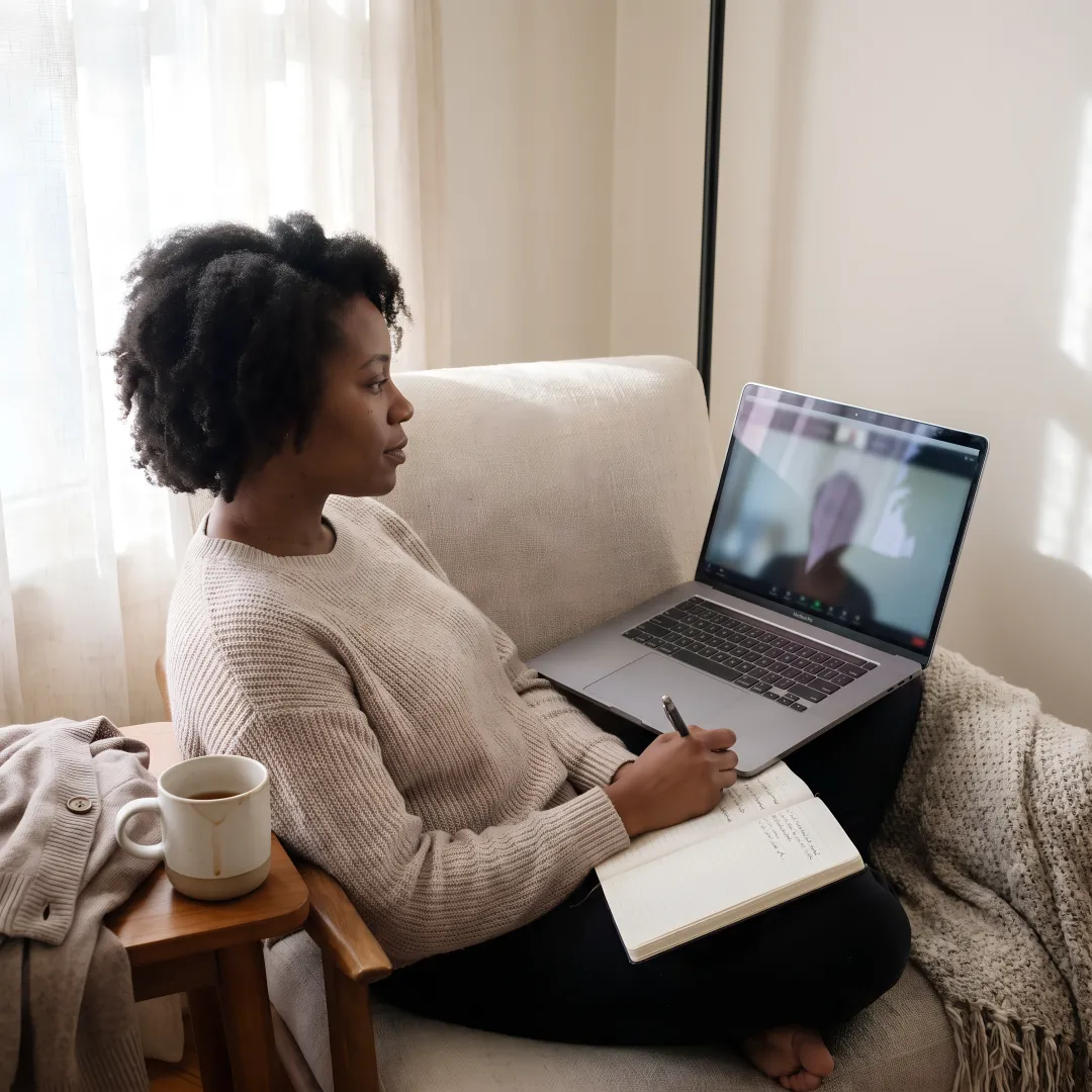 Woman in virtual trauma support consultation