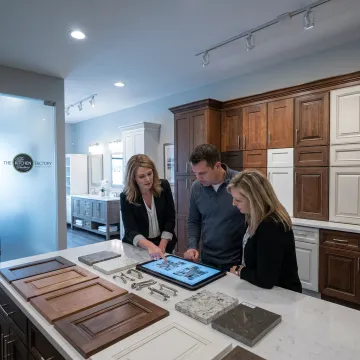 Designer reviewing kitchen and bath plans