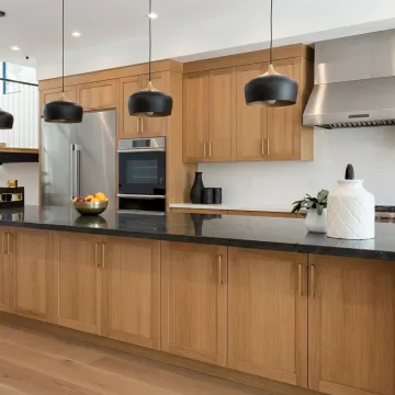 Luxury kitchen with refaced cabinets and custom island