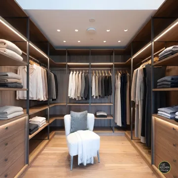 Luxury boutique walk-in closet with custom cabinetry