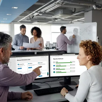 IT team managing Office 365 migration