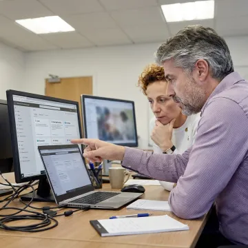 IT specialist assisting with Microsoft 365 support