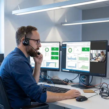 Remote IT support specialist assisting a business team