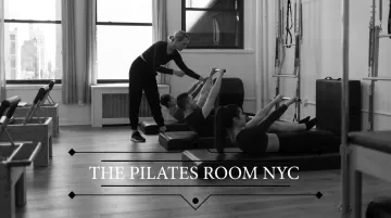Pilates Room NYC small group session with instructor guiding students on reformers
