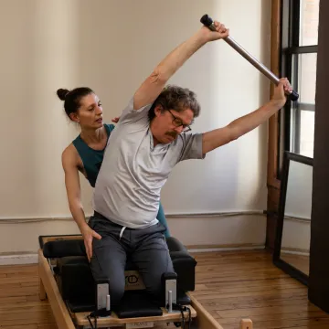 Private Pilates instruction in a boutique studio