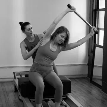 Beginner Pilates instruction in a boutique studio