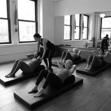 Mat Pilates class in a boutique studio