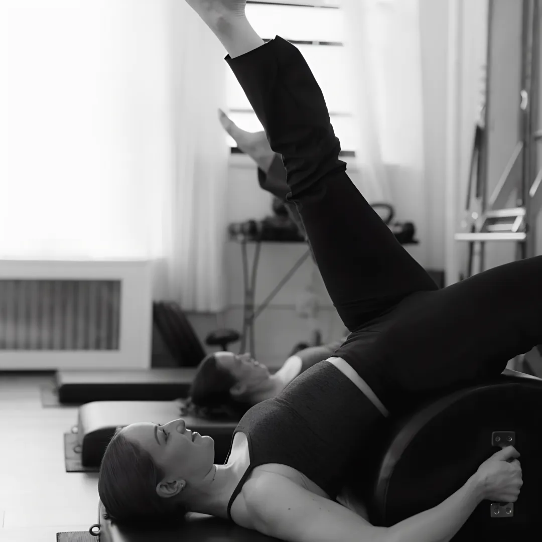 Small group strength training class in a NYC Pilates studio