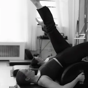 Small group strength training class in a NYC Pilates studio