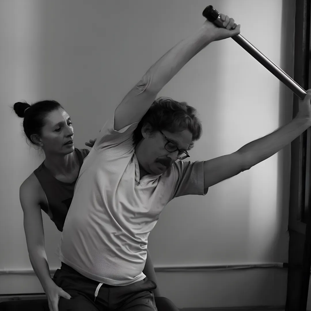 Pilates instructor customizing a private session