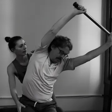 Pilates instructor customizing a private session