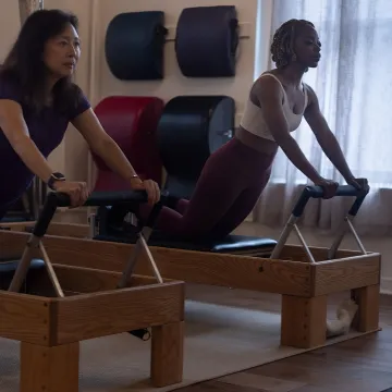 Pilates reformer class in a boutique studio