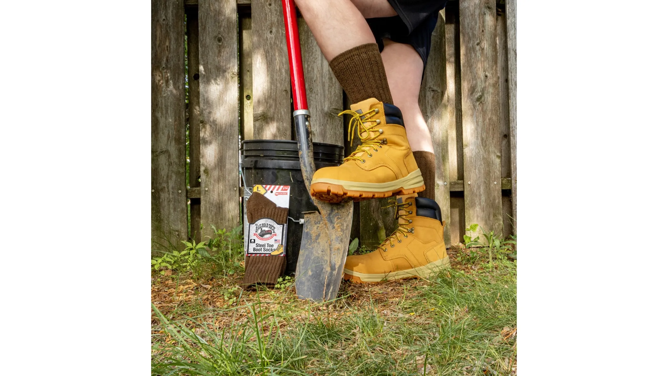 Construction worker standing in steel-toe boots on job site
