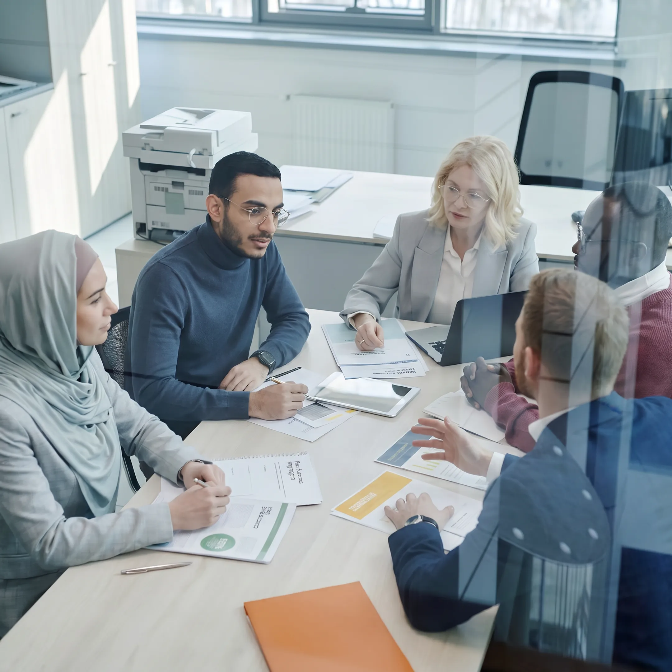 Cybersecurity consultant explaining assessment recommendations to an organization