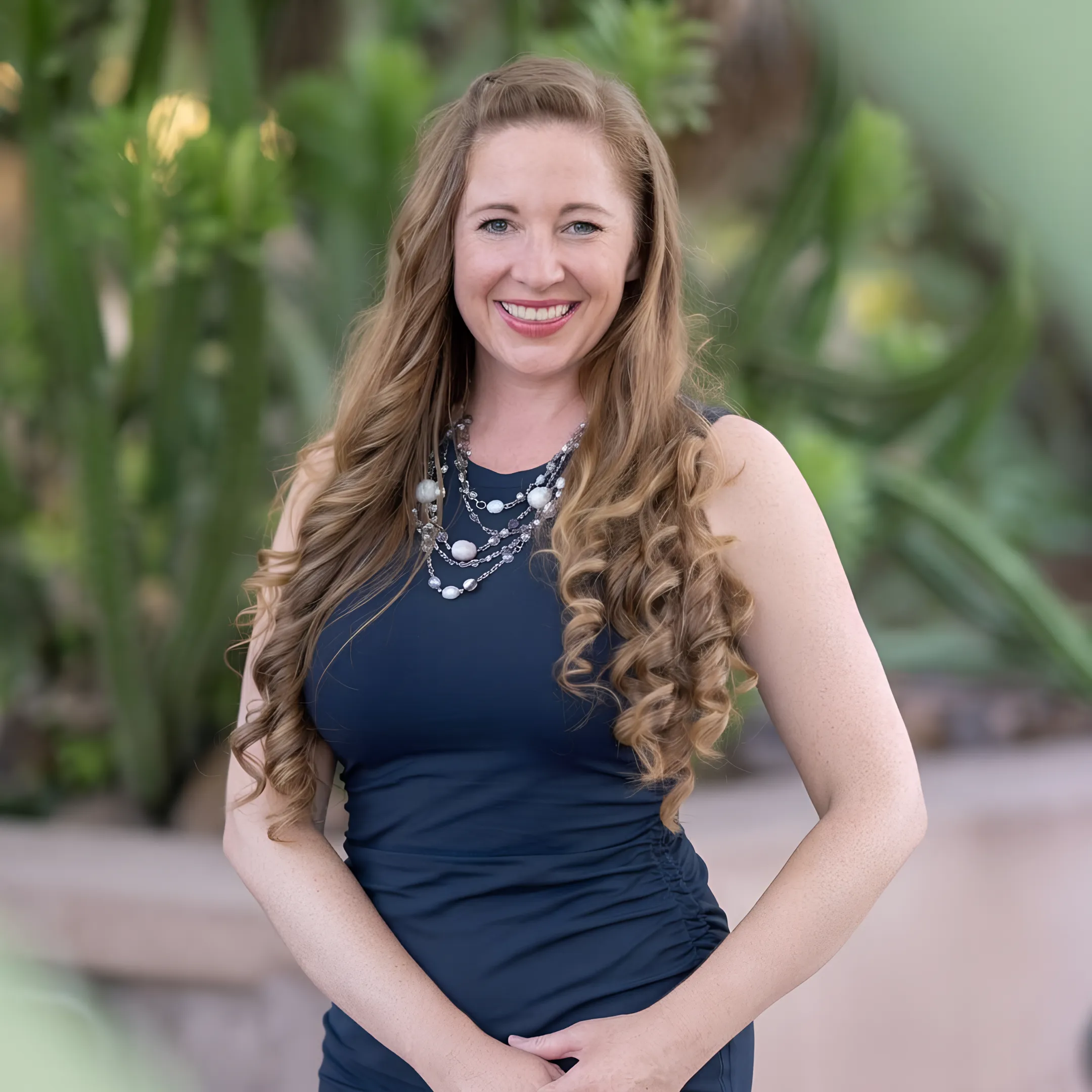 Portrait of Tiffany Hanson, Co-Founder & Business Solutions Strategist