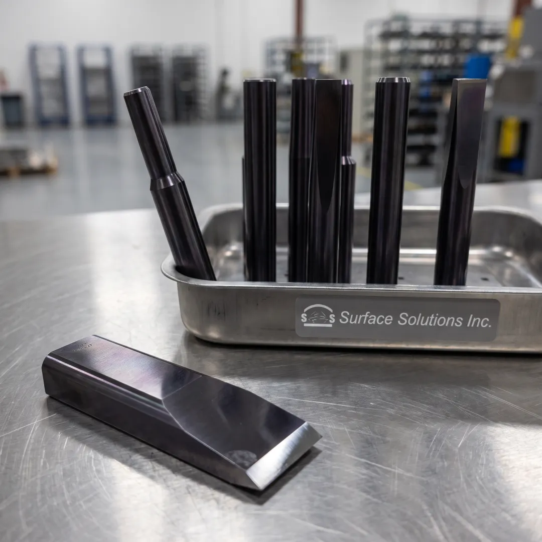 Coated tungsten carbide wear parts for industrial tooling