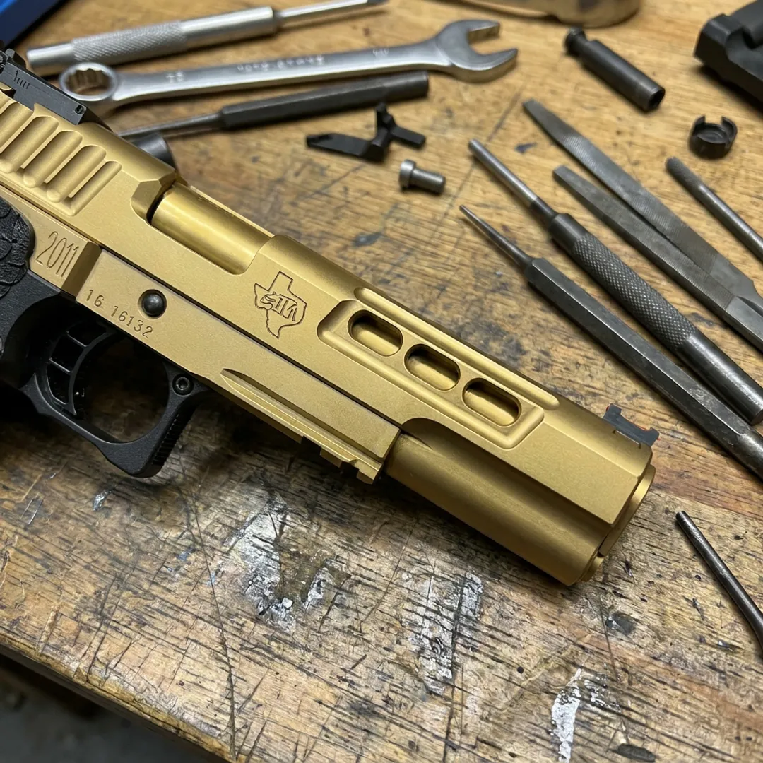 Gold titanium nitride coated gun barrel