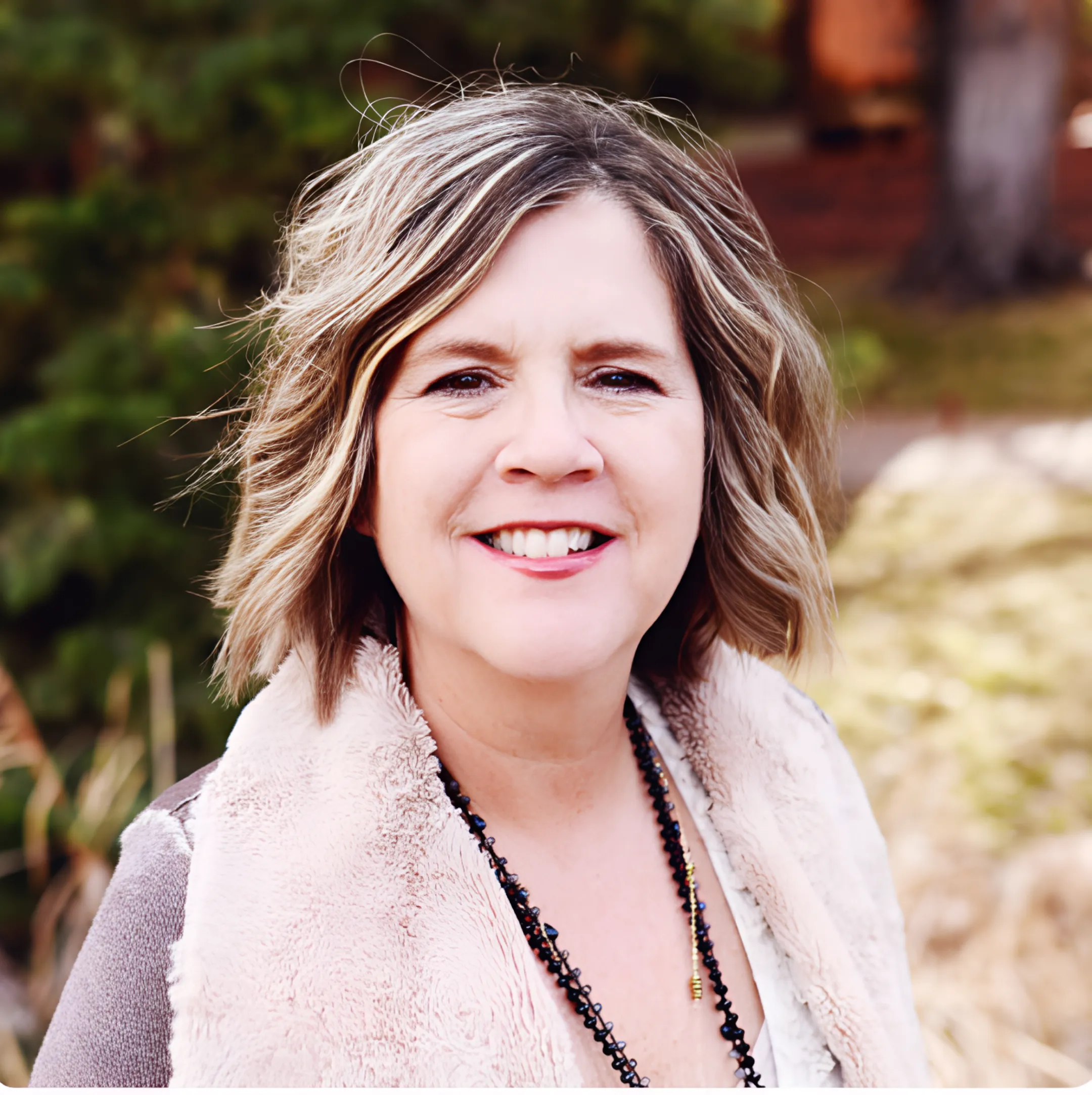 Portrait of Carolyn Riviere, Owner and Collaborative Counseling Specialist at TMS Center Centennial