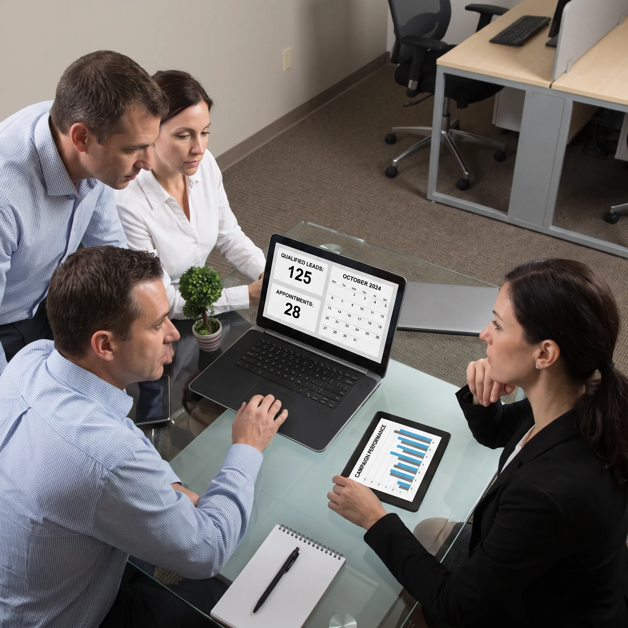 B2B sales team reviewing qualified prospects and appointment data on a digital dashboard