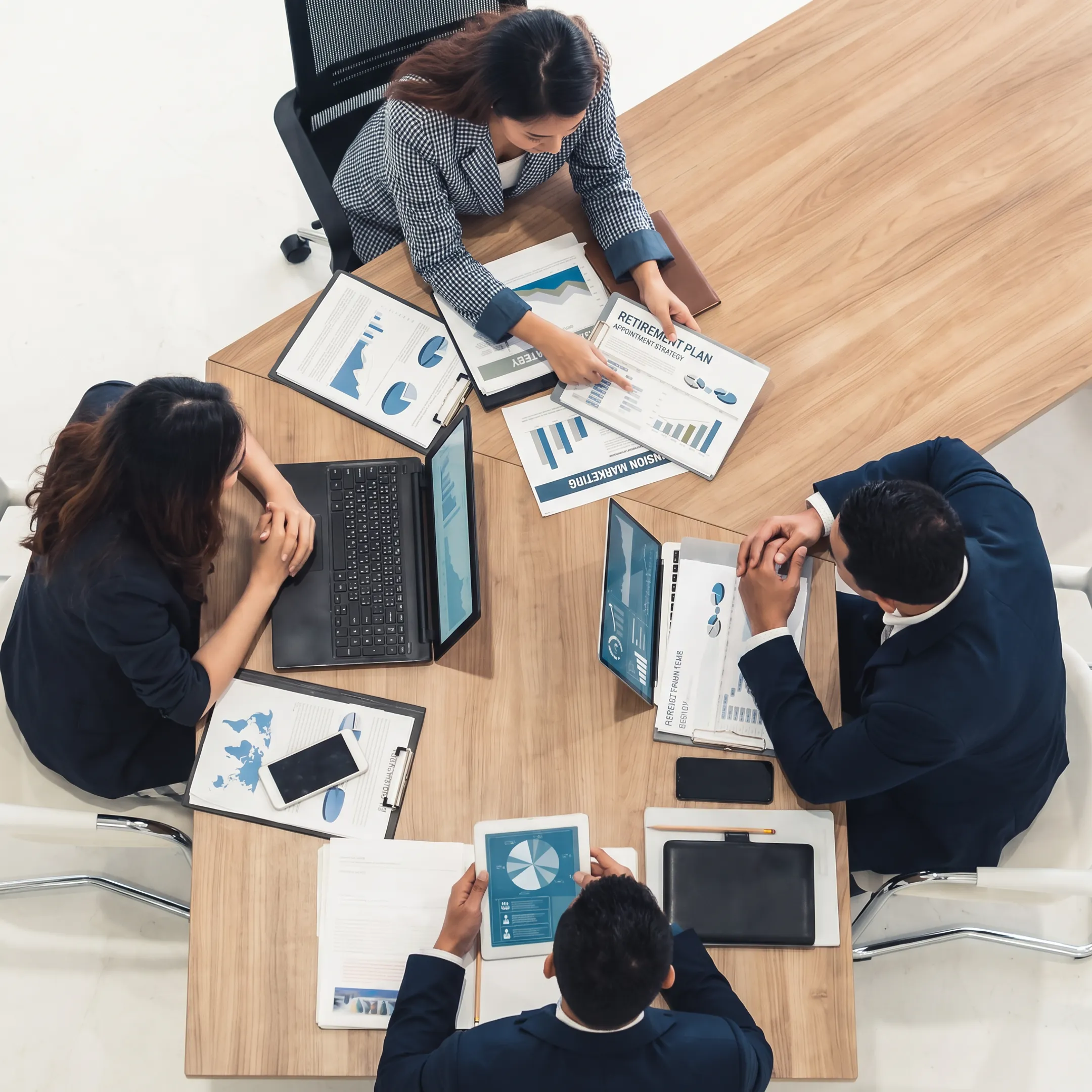 Retirement plan consultant discussing qualified appointment strategy with a business leader