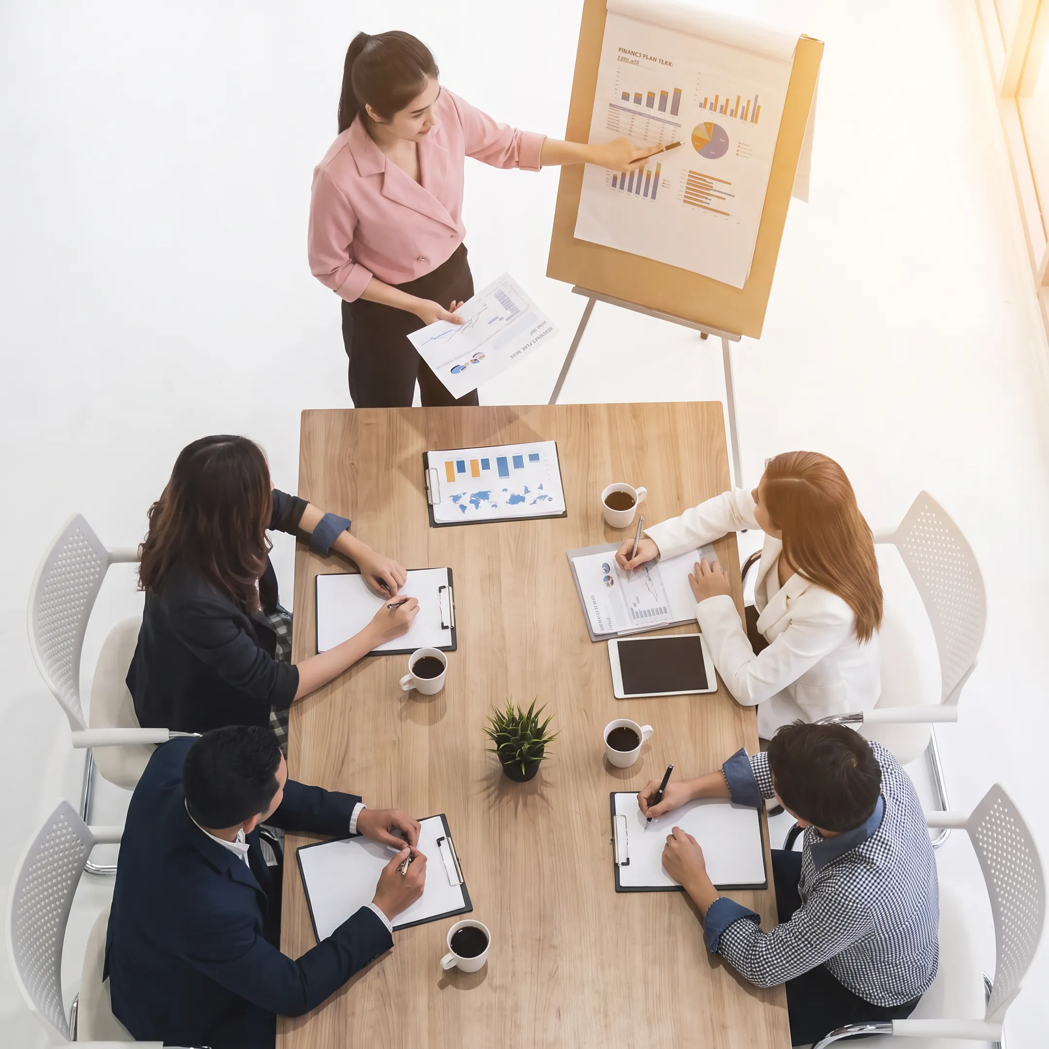 Financial advisor presenting a seminar to an engaged audience