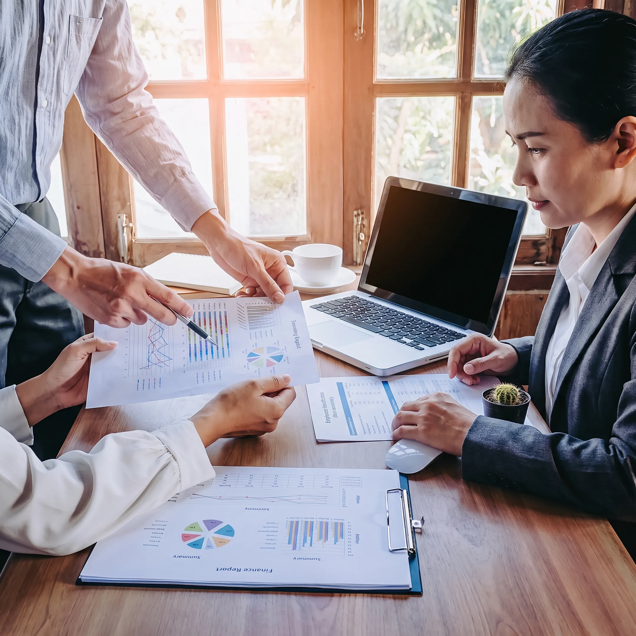 Sales professional reviewing qualified group benefits appointment details