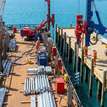Marine helical pile installation for waterfront infrastructure