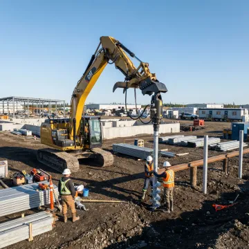 Commercial helical pile installation equipment working on foundation project
