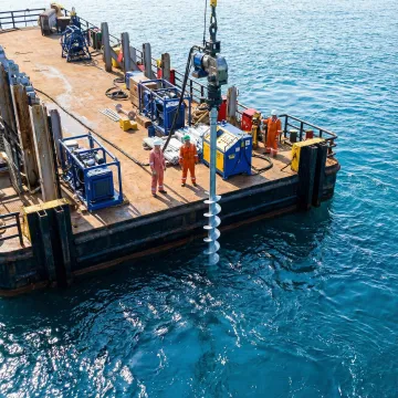 Marine helical pile installation in coastal waters