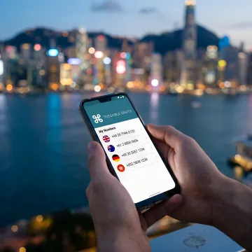 Hong Kong city skyline with a virtual phone number interface overlay