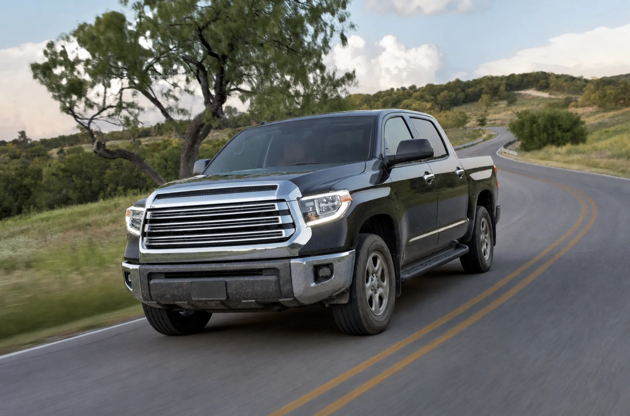 Used Toyota Tundra full-size pickup truck on road