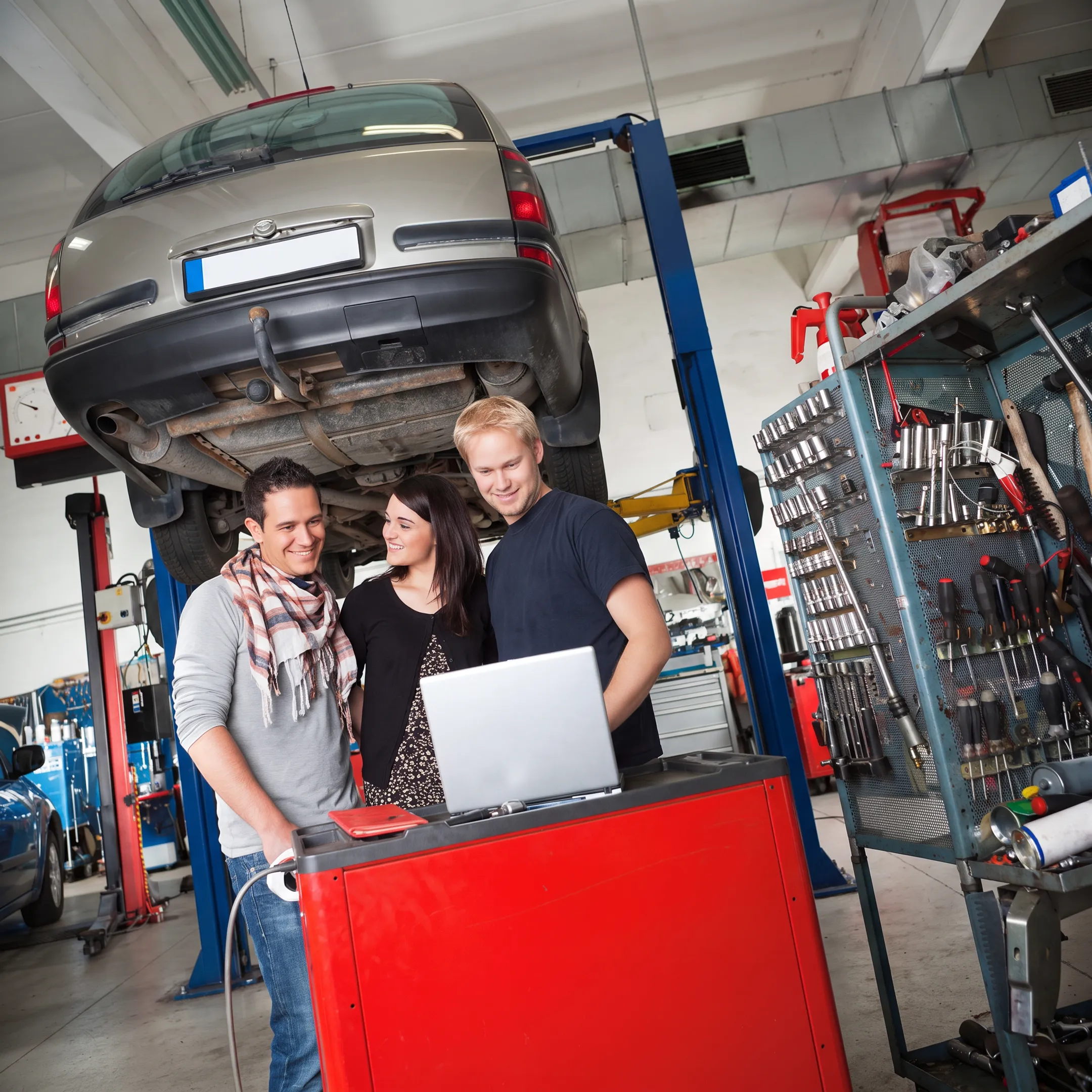 Toyota technician reviewing vehicle diagnostics during transmission service