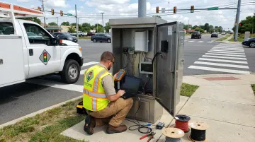 TCC factory-trained field technician commissioning traffic detection equipment onsite