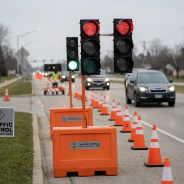 Temporary traffic lights controlling a road work zone