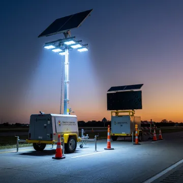 Solar light tower lighting a work zone